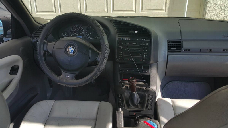 Illustration for article titled For $6,000, Could This 1999 BMW 323ci Prove That Form Follows Function?